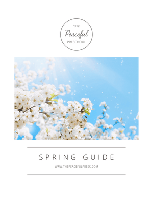 The Cover Art of the 4 week homeschool Spring Guide, with flowers on a blue background.